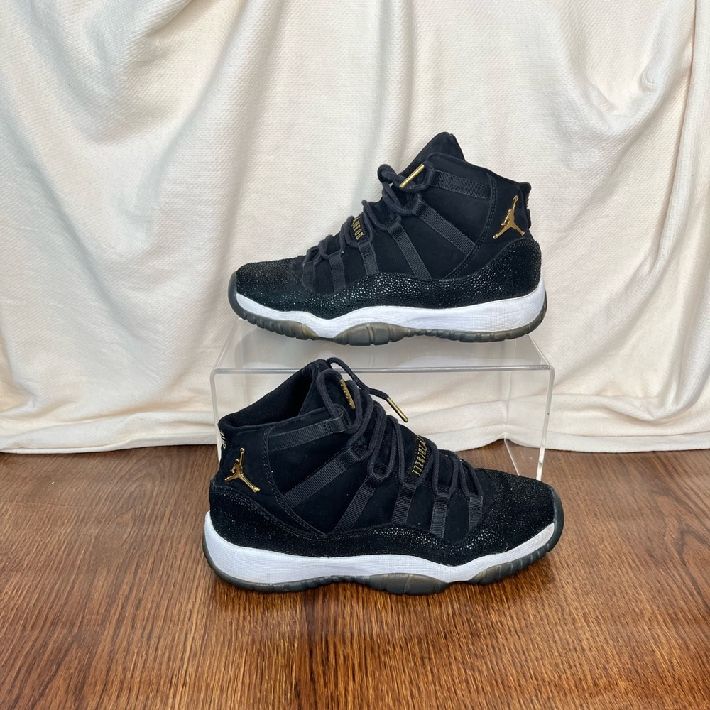 Jordan Retro 11 Black and Gold Sneakers